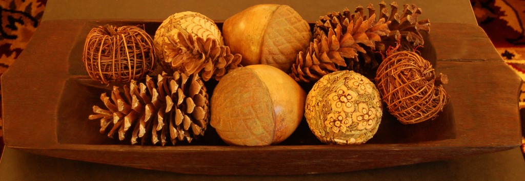 My antique bread bowl re-purposed on the coffee table.