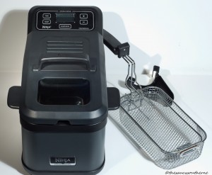 The Ninja® Professional Frying System with the unit, immersion basket with lid and oil pour spout
