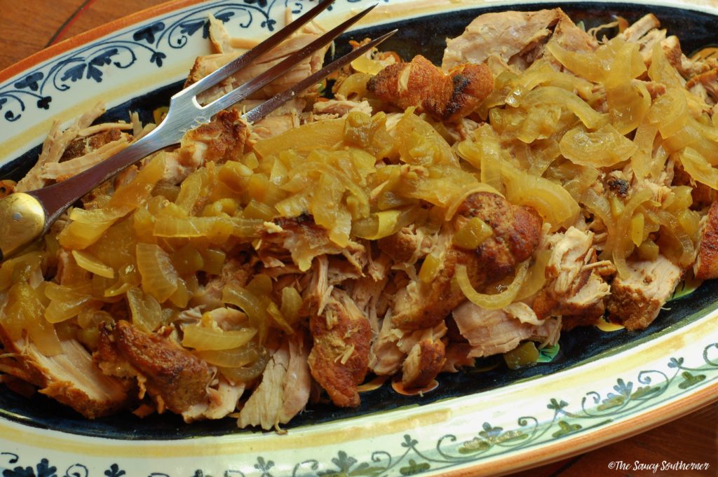 Green Chile Pulled Pork roast recipe, crockpot pulled pork, slow cooker pork roast, southwest, tex-mex flavors, easy recipe, green chiles, cumin, coriander, chili powder, onions, garlic, the saucy southerner